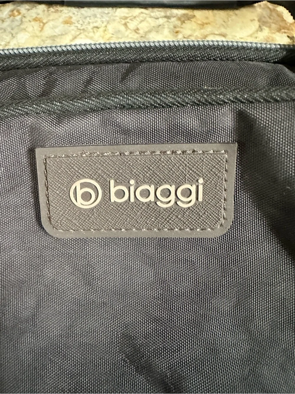 Biaggi roller bag duffel compact 4 wheels black like new 17” high luggage